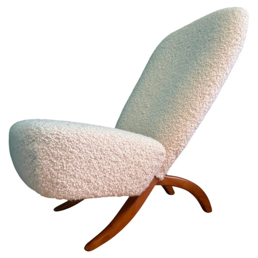 Een zorgvuldig herstel voor deze open Nederlandse designfauteuil